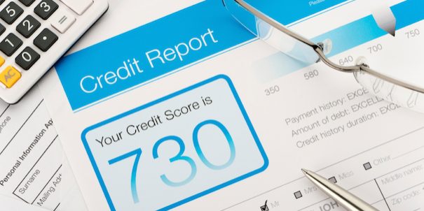 Credit report with score on a desk